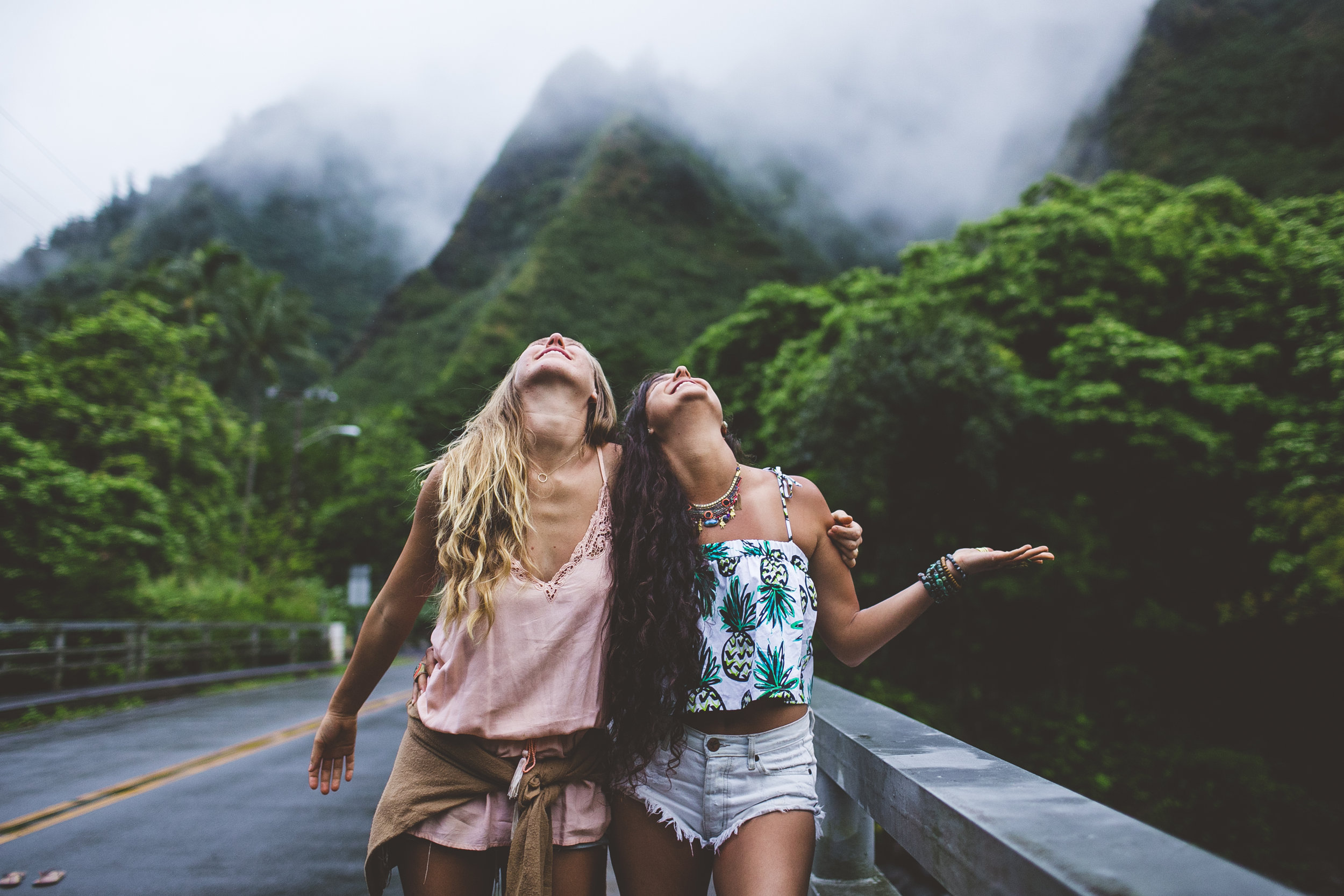 Young women having fun in hawaii photos