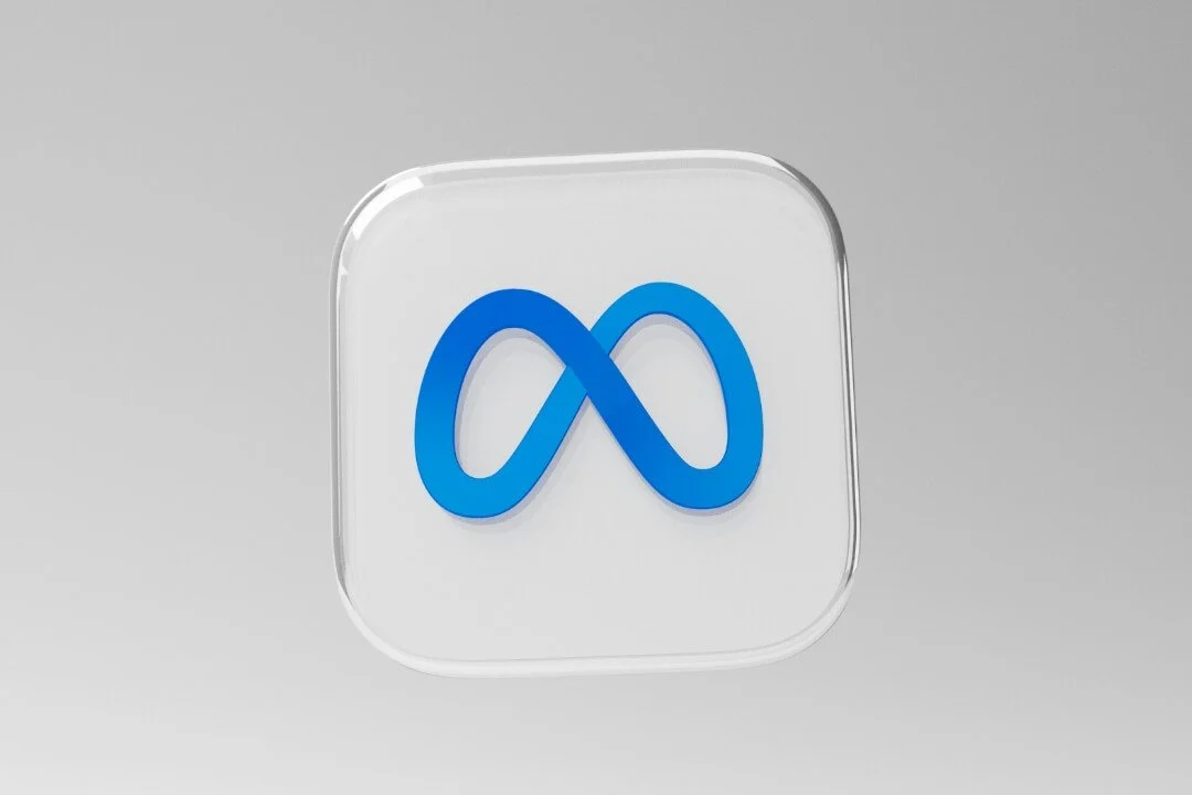 3D glass Meta logo on a light grey background, representing freelance Meta advertising and creative performance consulting services.