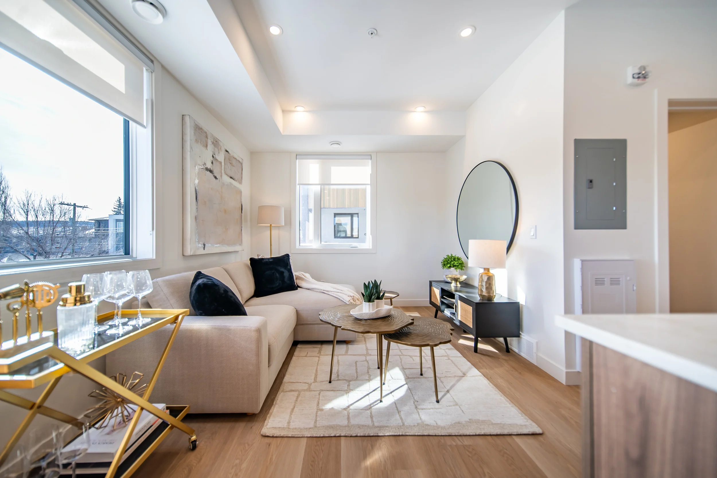 Open concept living space in townhomes for rent in Calgary with seamless kitchen and dining area