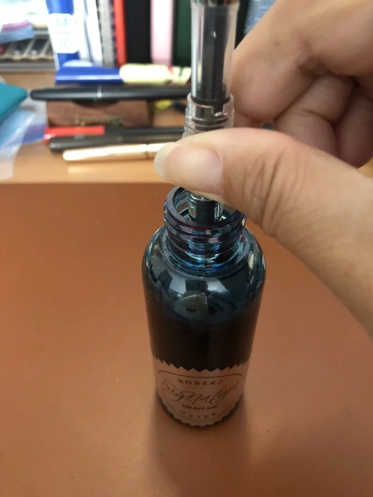 Pressing down the piston...