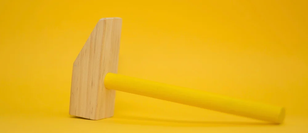 A toy hammer. Photo by Markus Spiske on Unsplash
