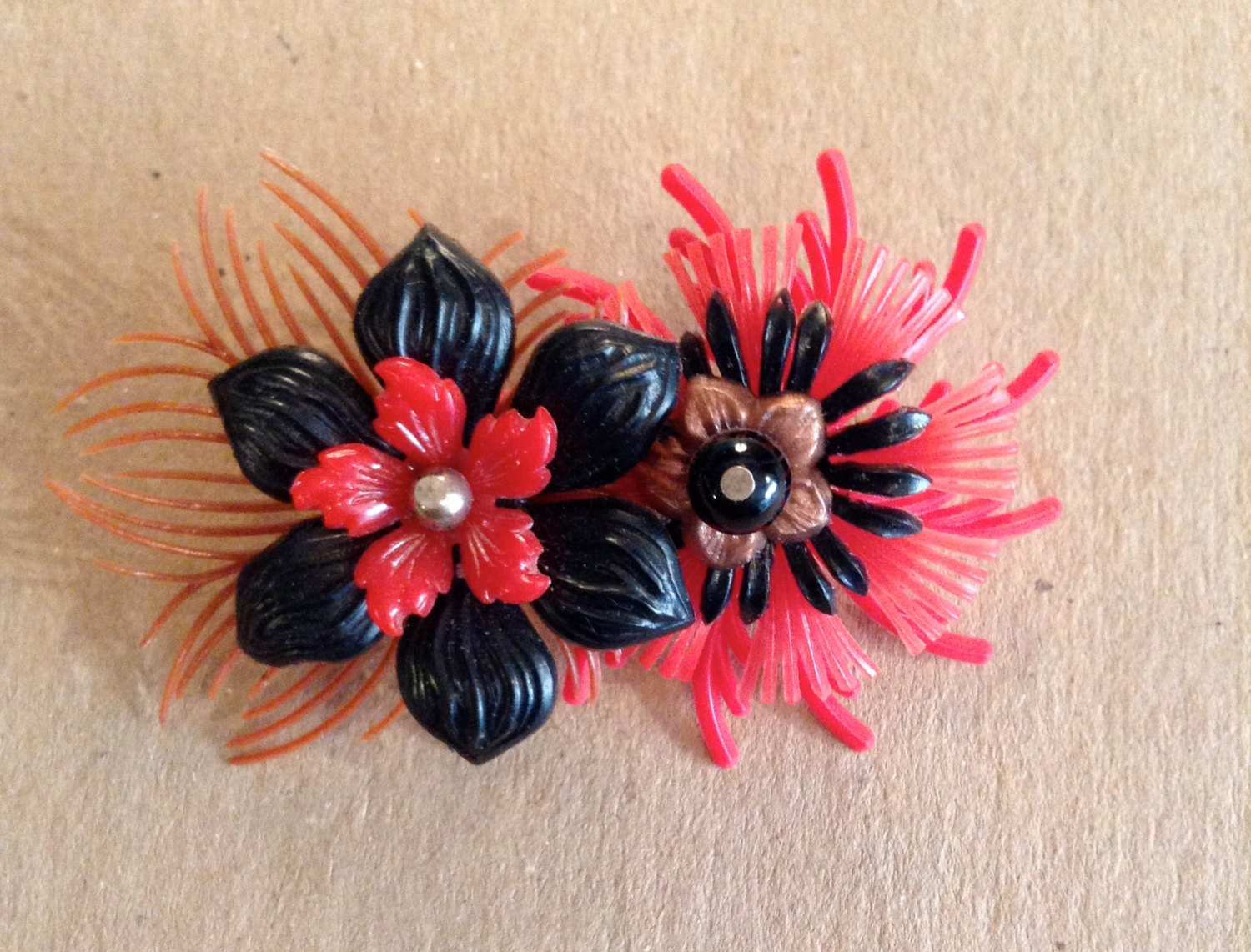 red brooch