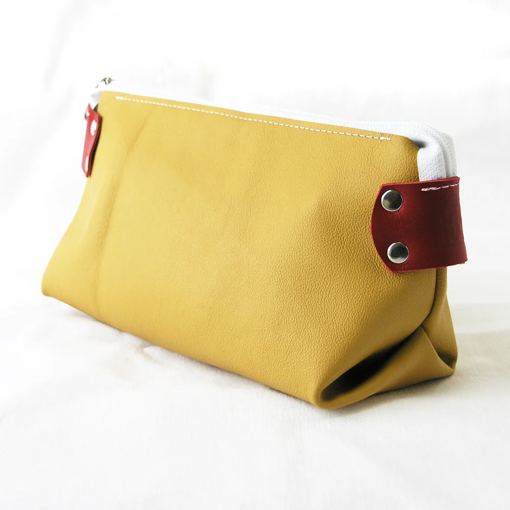 yellow toiletry bag