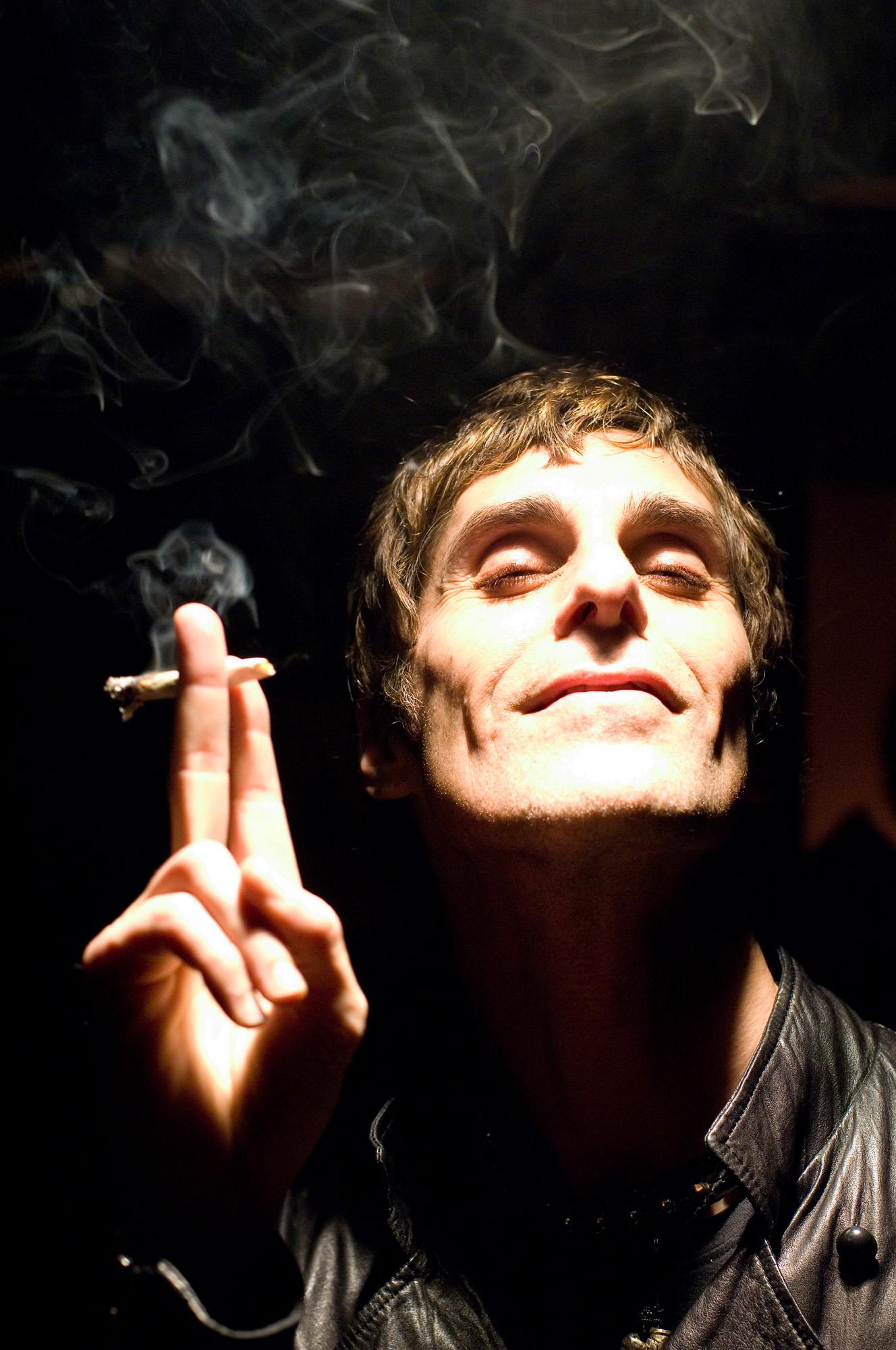 Perry Farrell smoking a cigarette (or weed)
