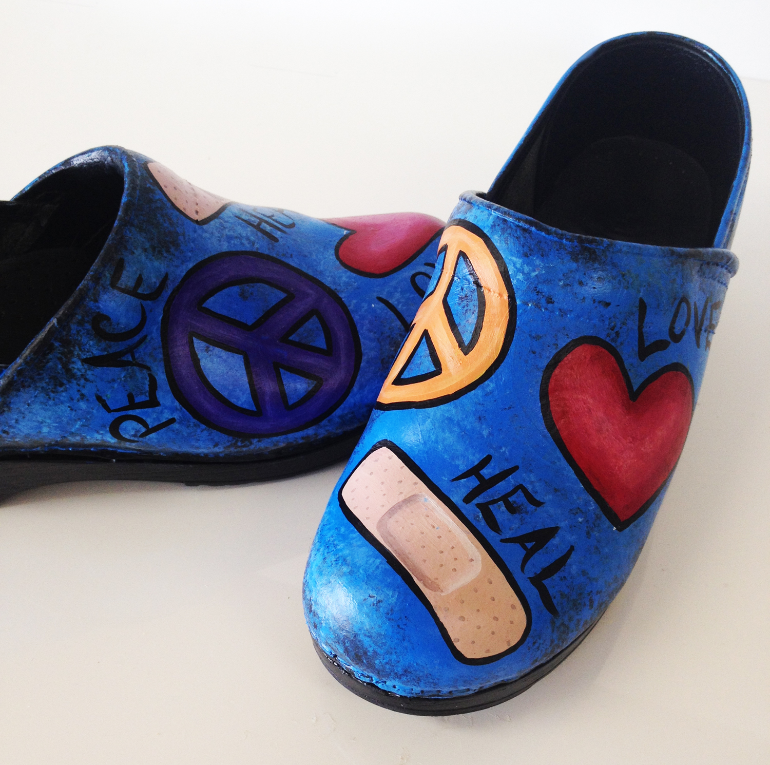dansko peace and love clogs