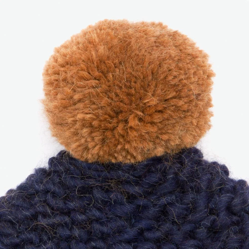 brown bobble hat