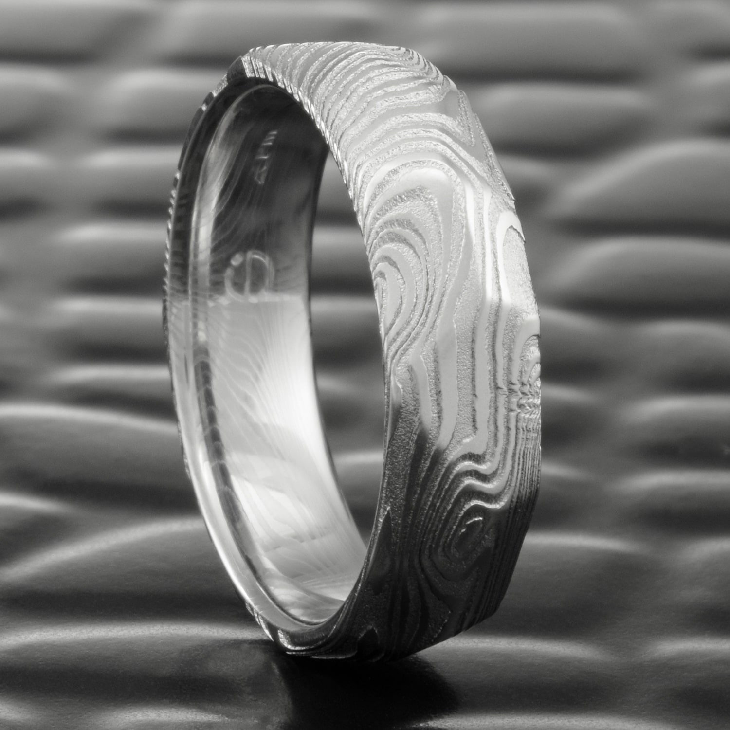 Hand Faceted Damascus Steel Ring With Woodgrain Epic Wood