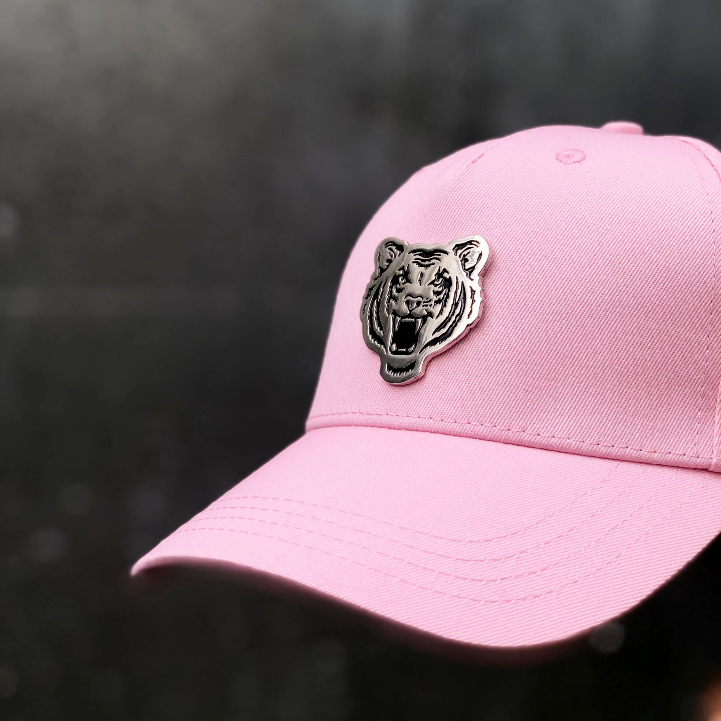 black and pink baseball cap