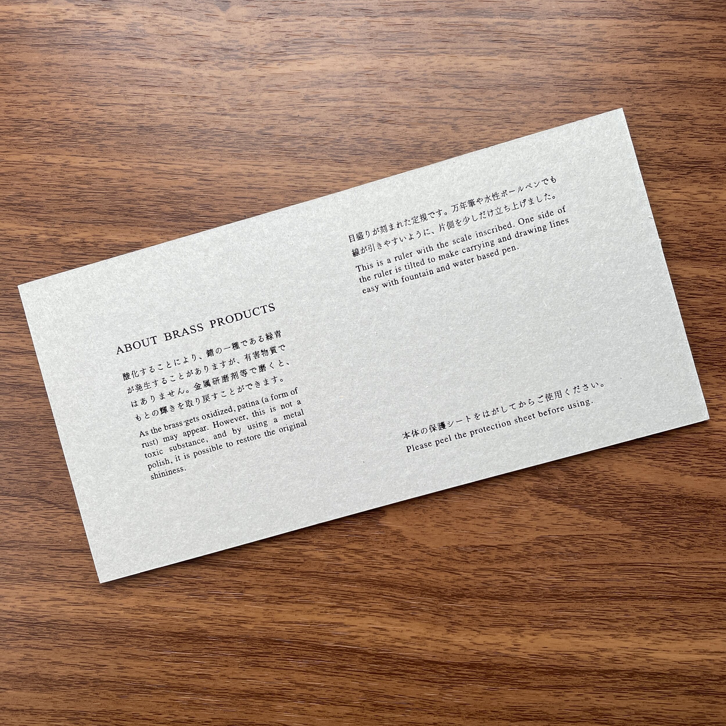游客's-Company-Brass-Reverse-Details