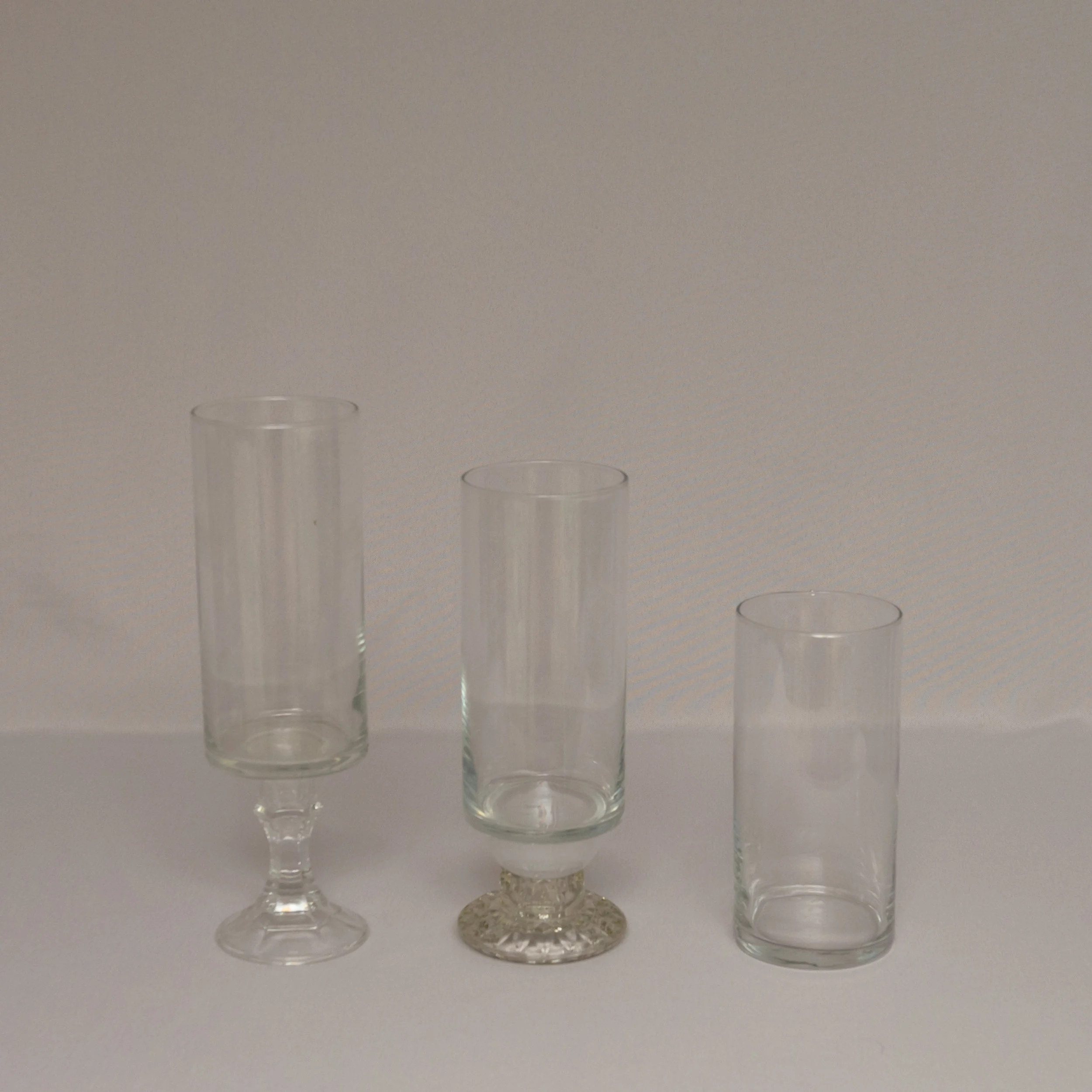 7 25 X 3 5 Cylinder Vases Assorted Pedestal Heights Power Of