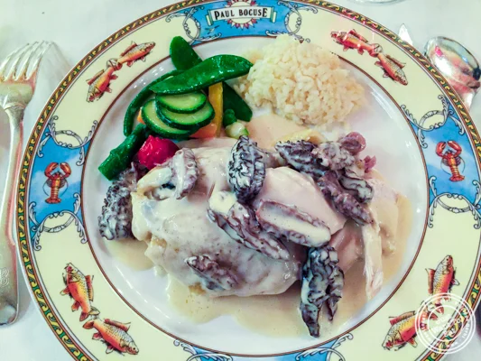 Bresse chicken cooked in a bladder at L'Auberge du Pont de Condongesof Paul Bocuse in France
