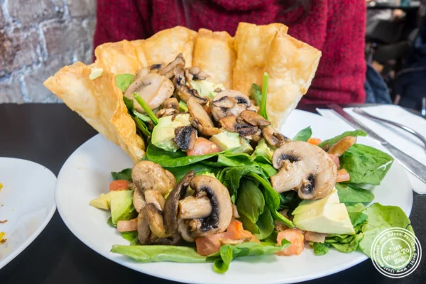 Spinach salad at 叠煎饼屋and Cafe in Hoboken, NJ