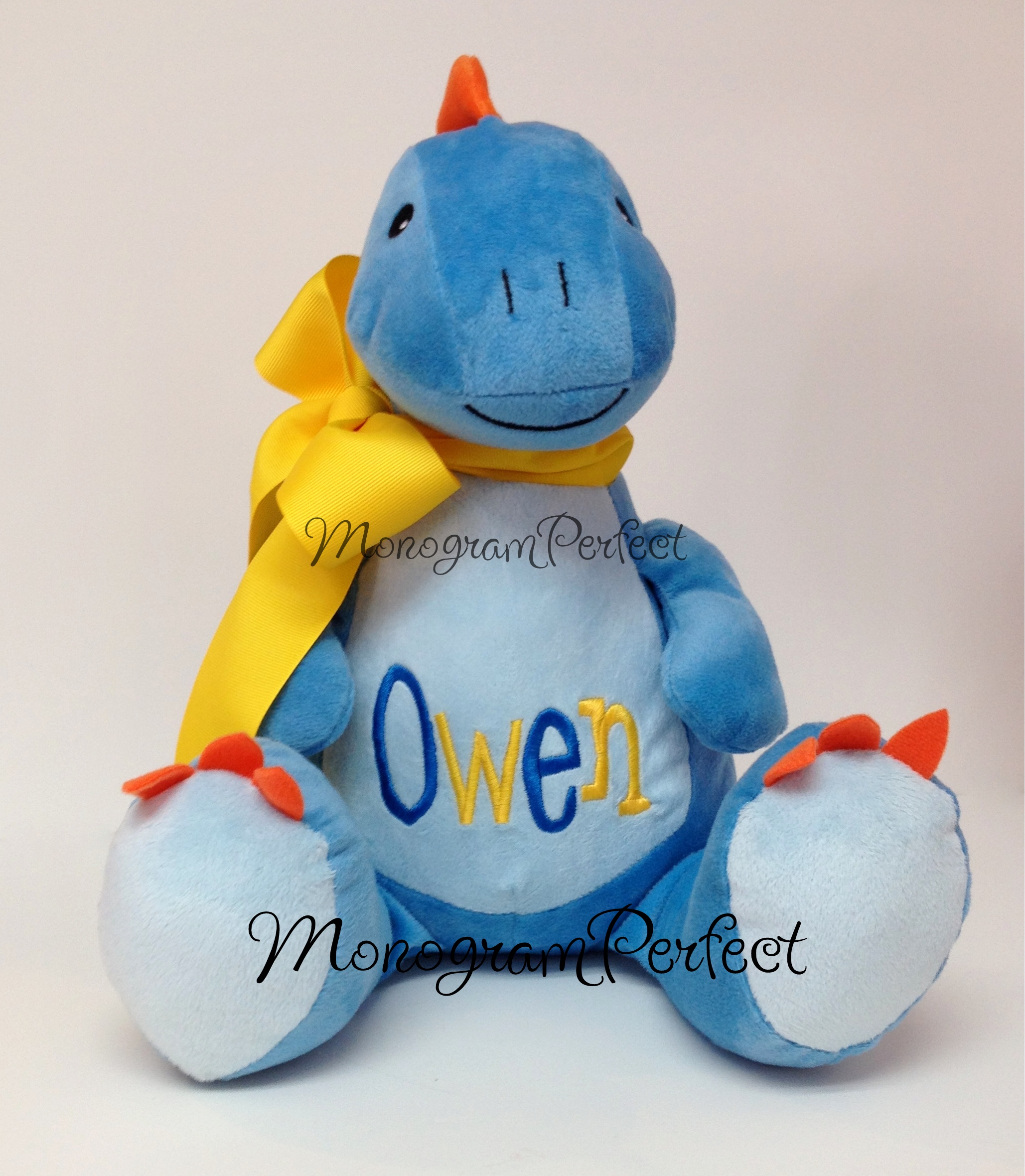stuffed blue dinosaur