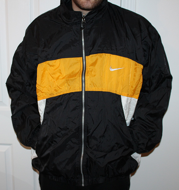 yellow and black jacket nike