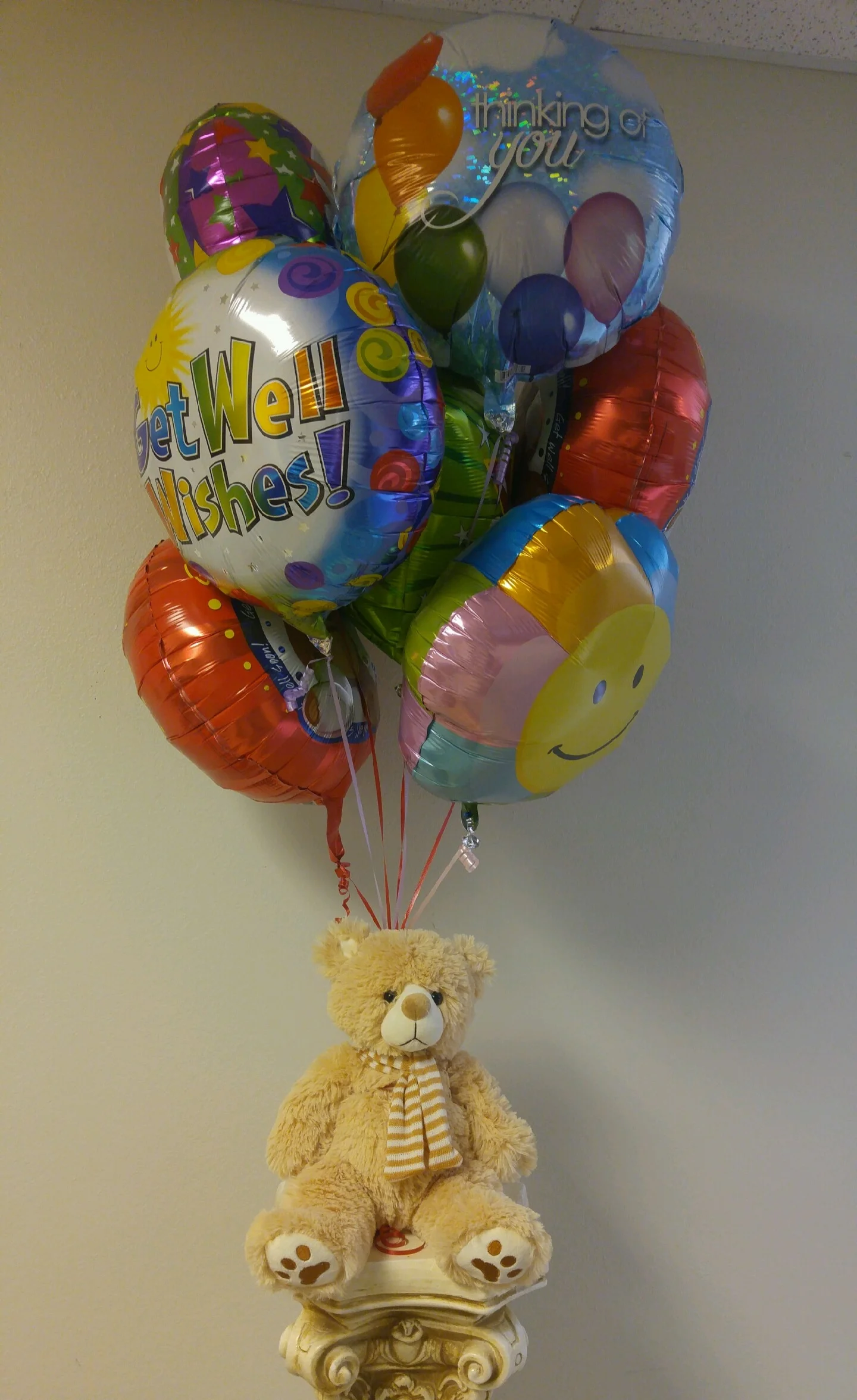 get well balloons and teddy bear