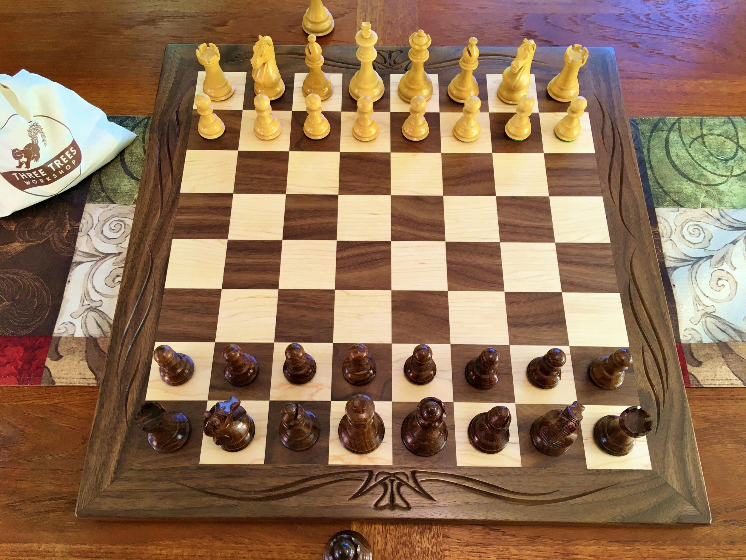 Tournament size wooden chess board with carved border and wooden pieces —  Three Trees Workshop