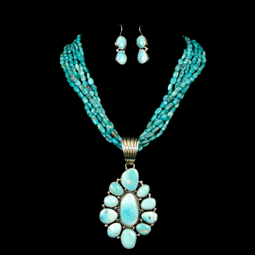 silver pendant and earring set