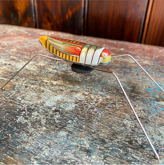 Jumping sales grasshopper toy