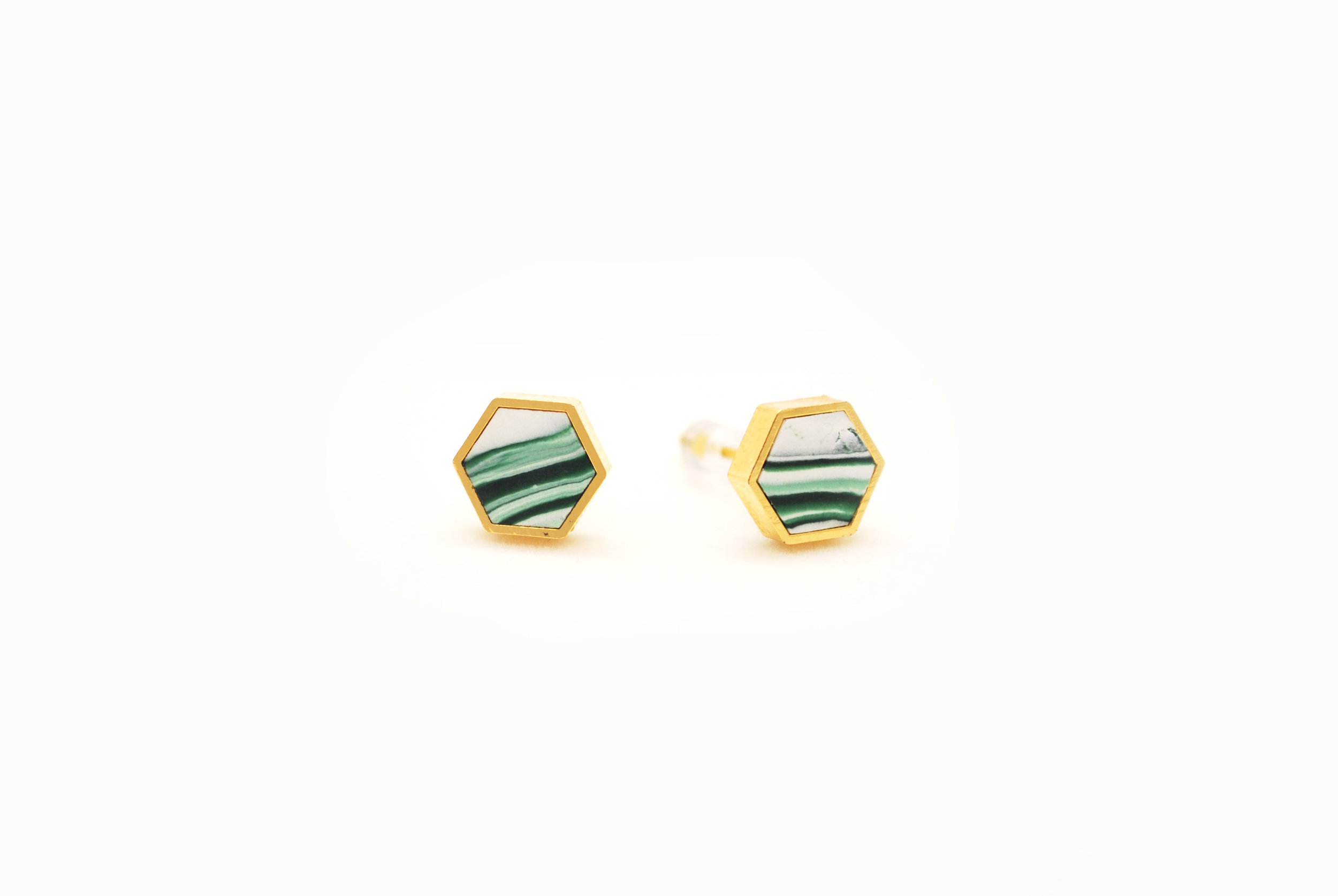 Hexagonal stud earrings in a granite style with gold leaf