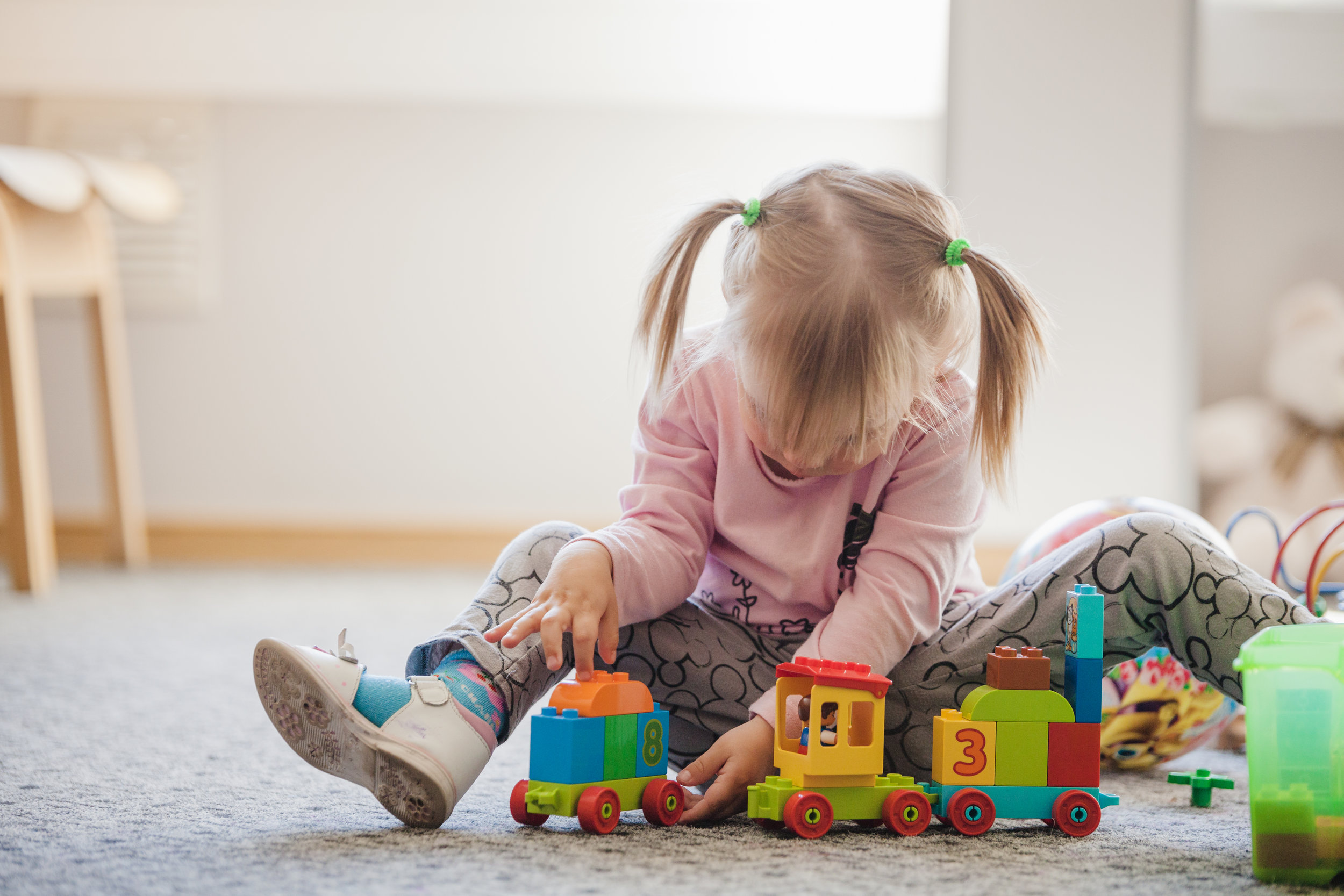 Girls playing toys