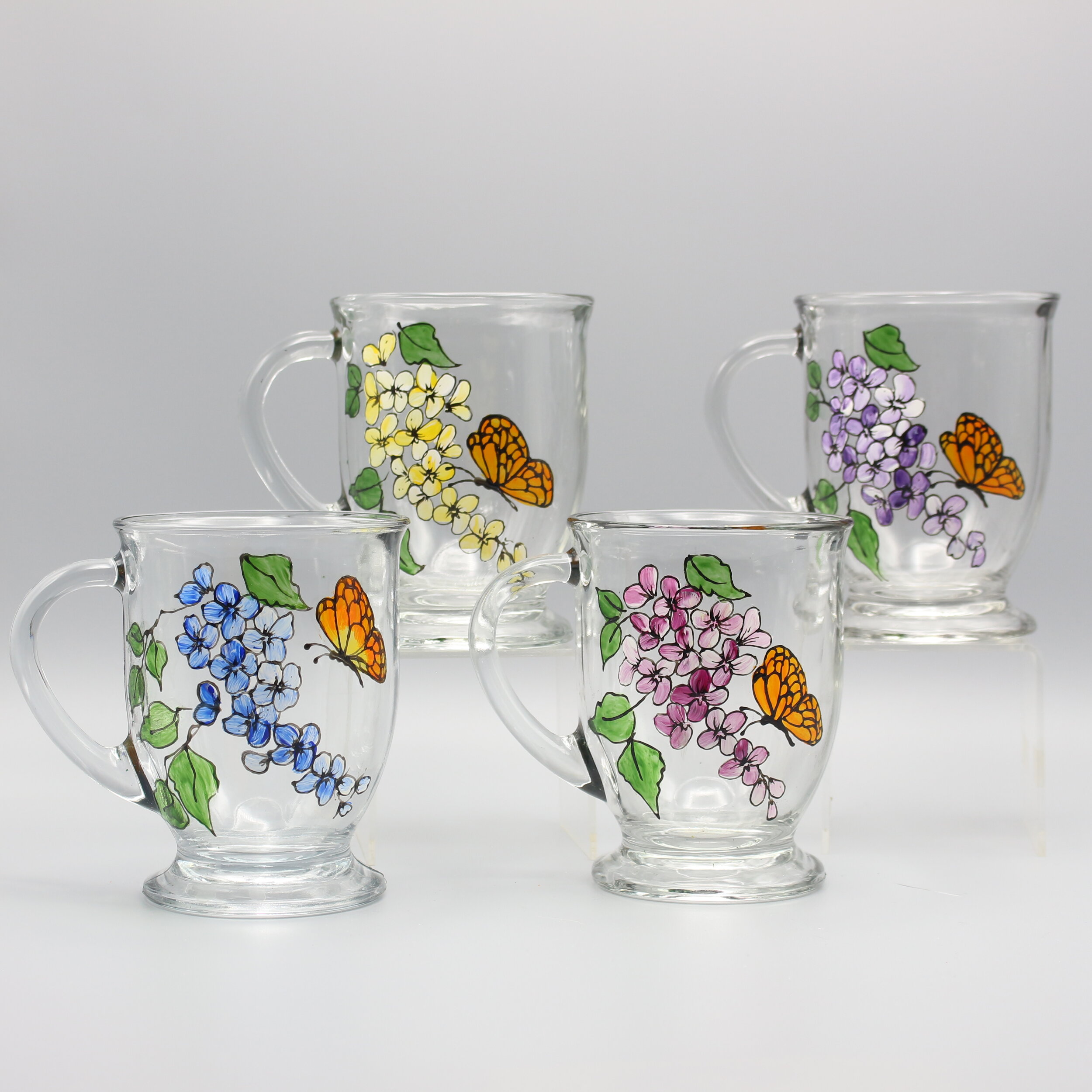 http://images.squarespace-cdn.com/content/v1/5570dc78e4b0bbe8e5cab3d0/1581986635819-S7AIYGQP3JPAW0M648BX/butterfly_and_flower_coffee_mugs.JPG