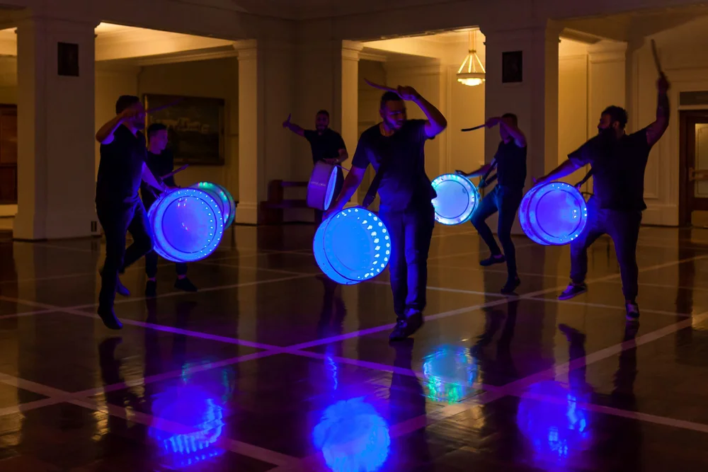 Angelica Mesiti, ASSEMBLY, 2019 (production still) three-channel video installation in architectural amphitheater. HD video projections, color, six-channel mono sound, 25 mins, dimensions variable. © Photography: Bonnie Elliott. Commissioned by the Australia Council for the Arts. Courtesy of the artist and Anna Schwartz Gallery, Australia and Galerie Allen, Paris.