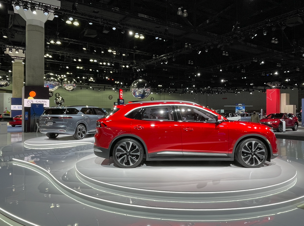The three-row VF e36 is in the background.