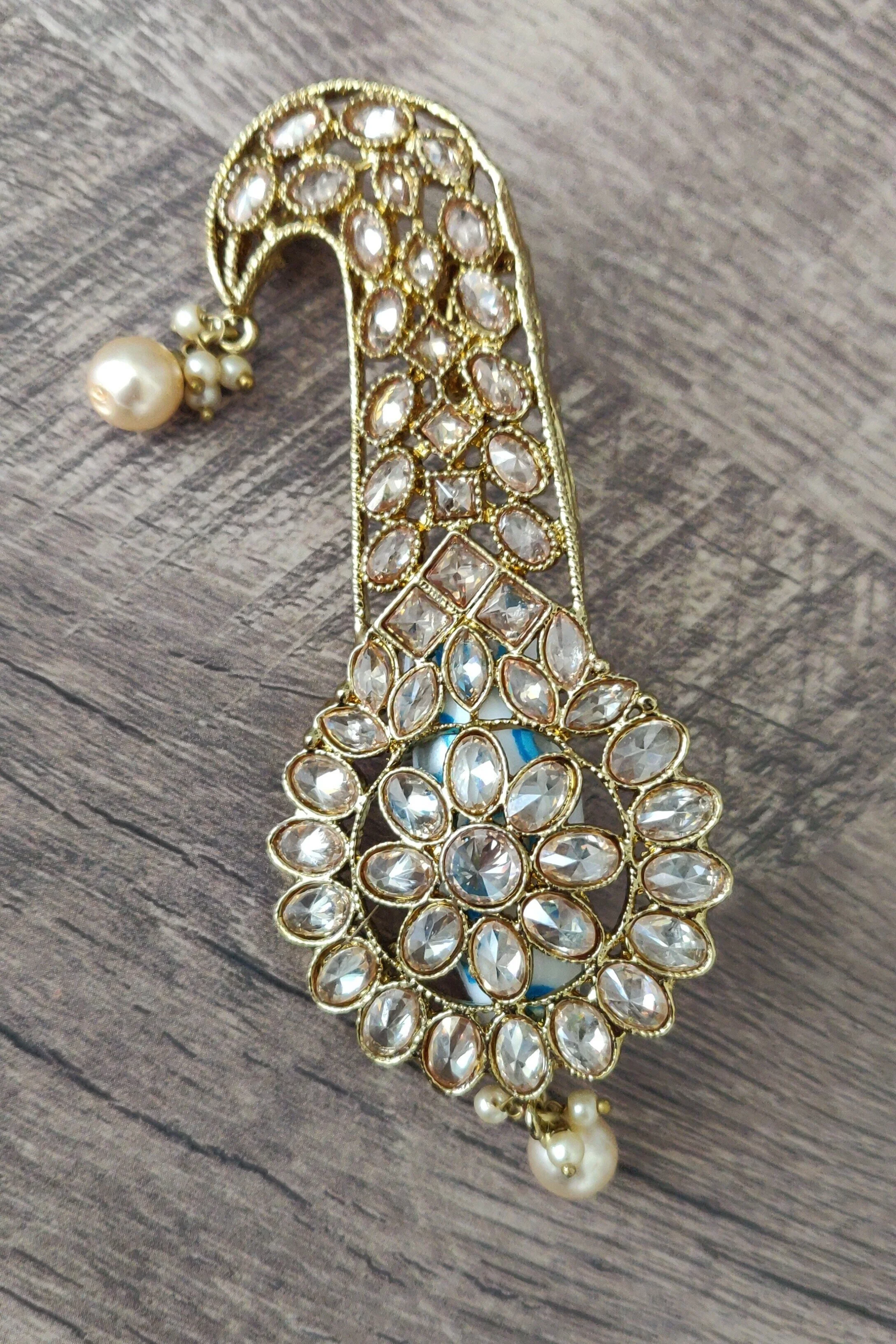 Turban brooch store