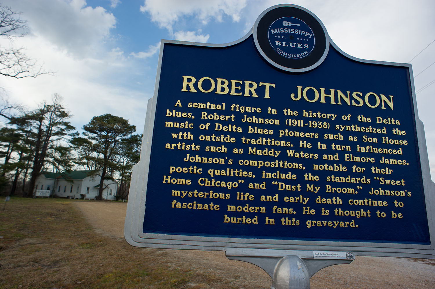  There are three memorial markers for Blues legend Robert Johnson scattered within twenty miles of Greenwood, Mississippi. This marker sits in the cemetery next to Little Zion Missionary Baptist church to the north of town. 