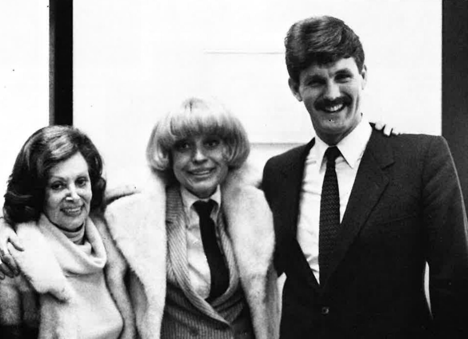 From left to right: Essee Kupcinet, Carol Channing, and Larry Jordan. They are smiling at the camera with their arms around each other's shoulders.