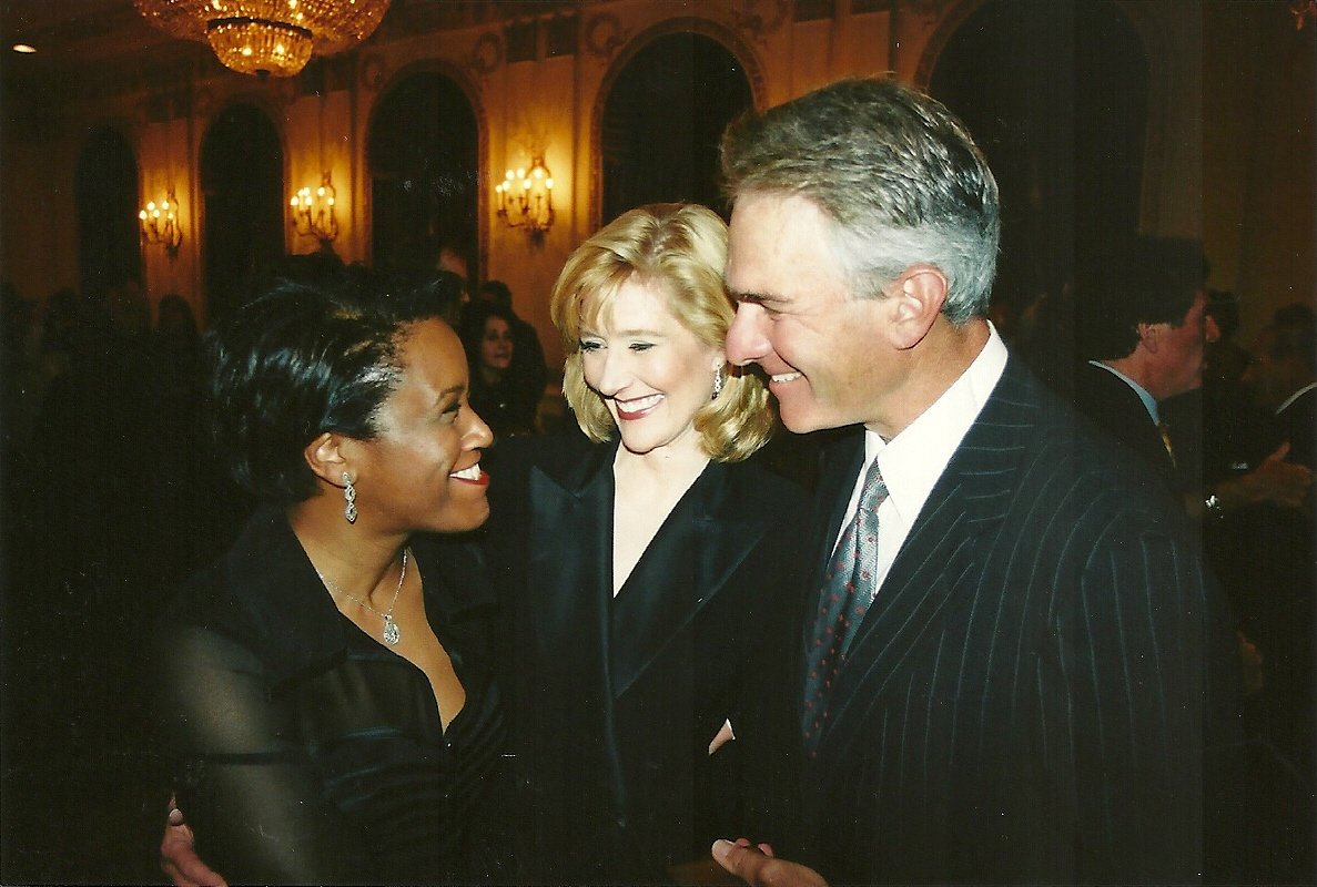 From left to right: Pam Jordan, Mary Ann Childers, and Jay Levine at an Academy Gala. They are all standing close to each other and smiling.