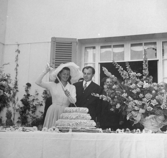 Prince Ali Khan and Rita Hayworth cutting into their wedding cake at Khan’s Riviera Chateau de L’Horizon, May 27, 1949 | LIFE Magazine