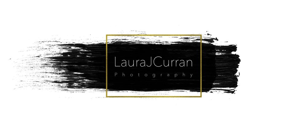 Laura J Curran