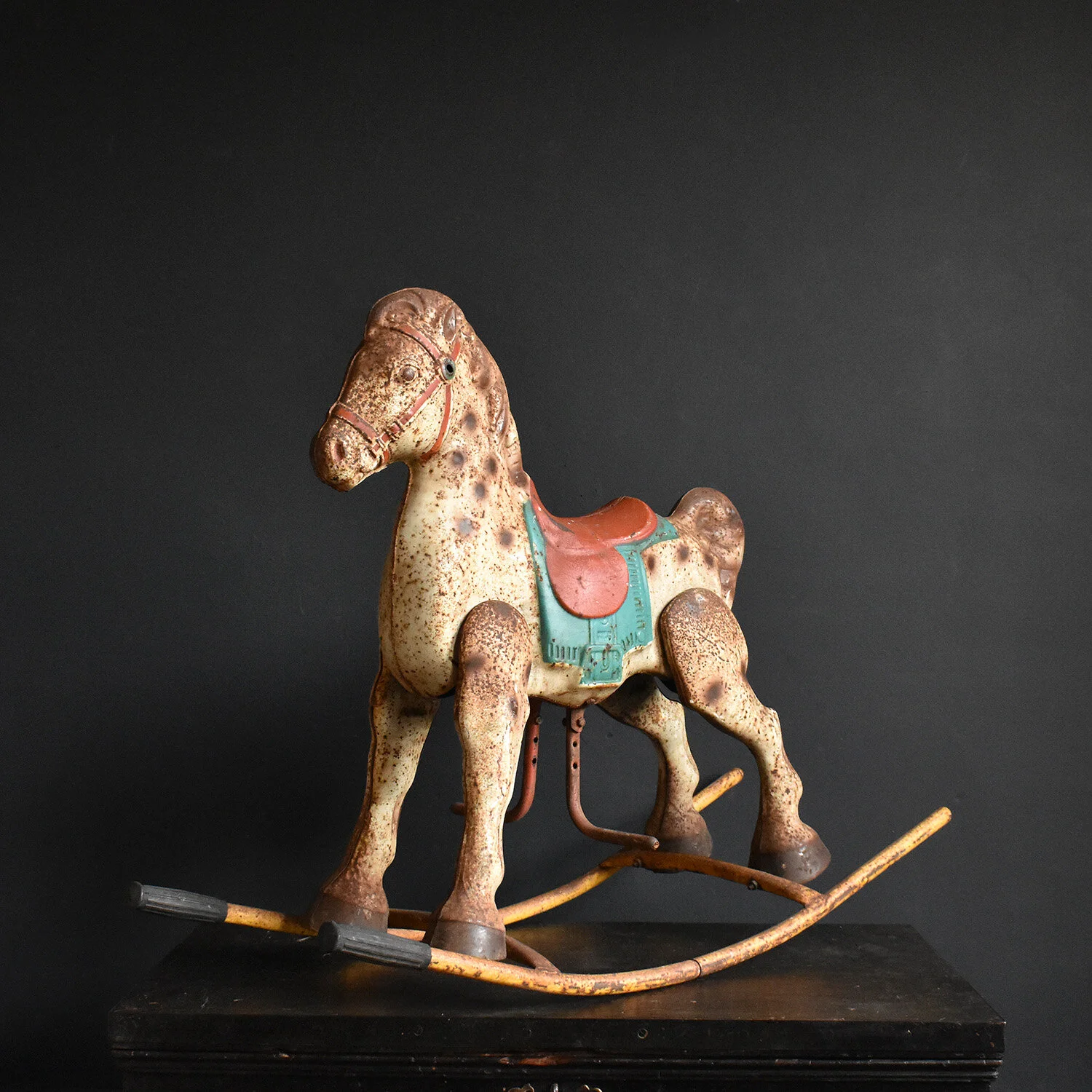 tin rocking horse