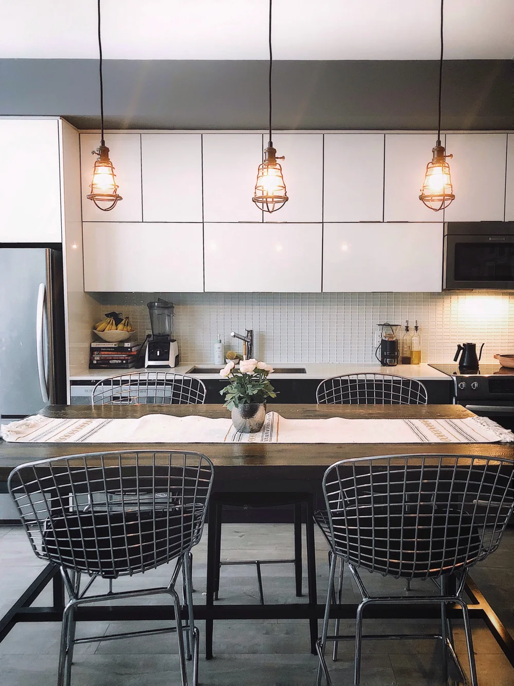 View of the kitchen and the dining table