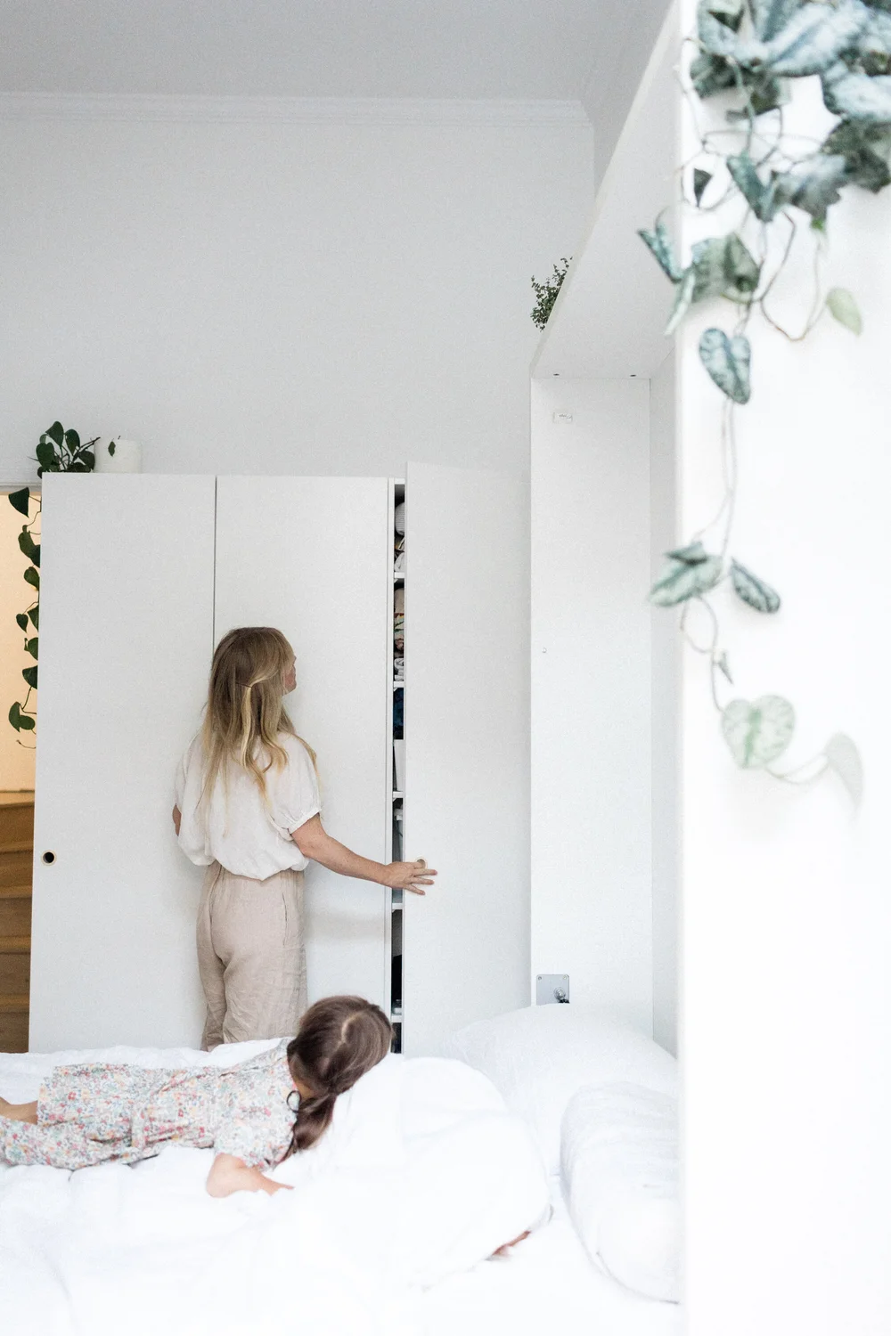 The den that is now a bedroom with our wall bed and narrow wardrobes. Photo by Amy Highton