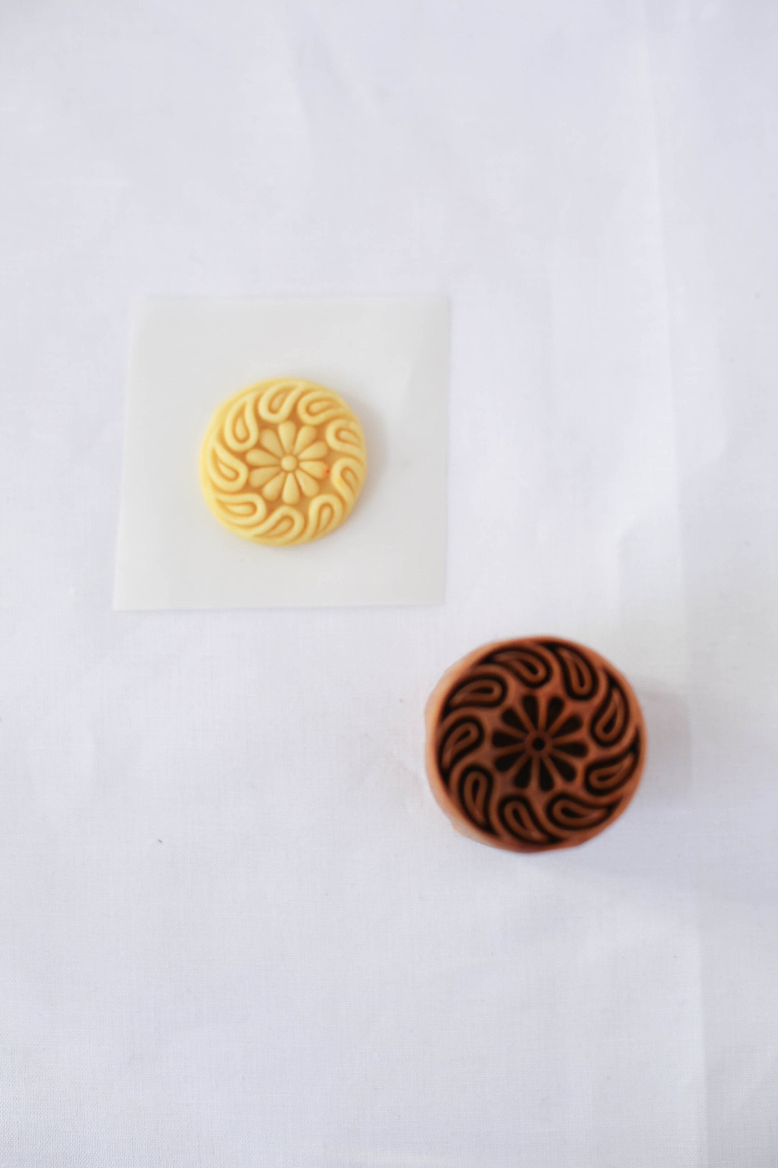 Using polymer clay with a Mooncake press with many different uses.