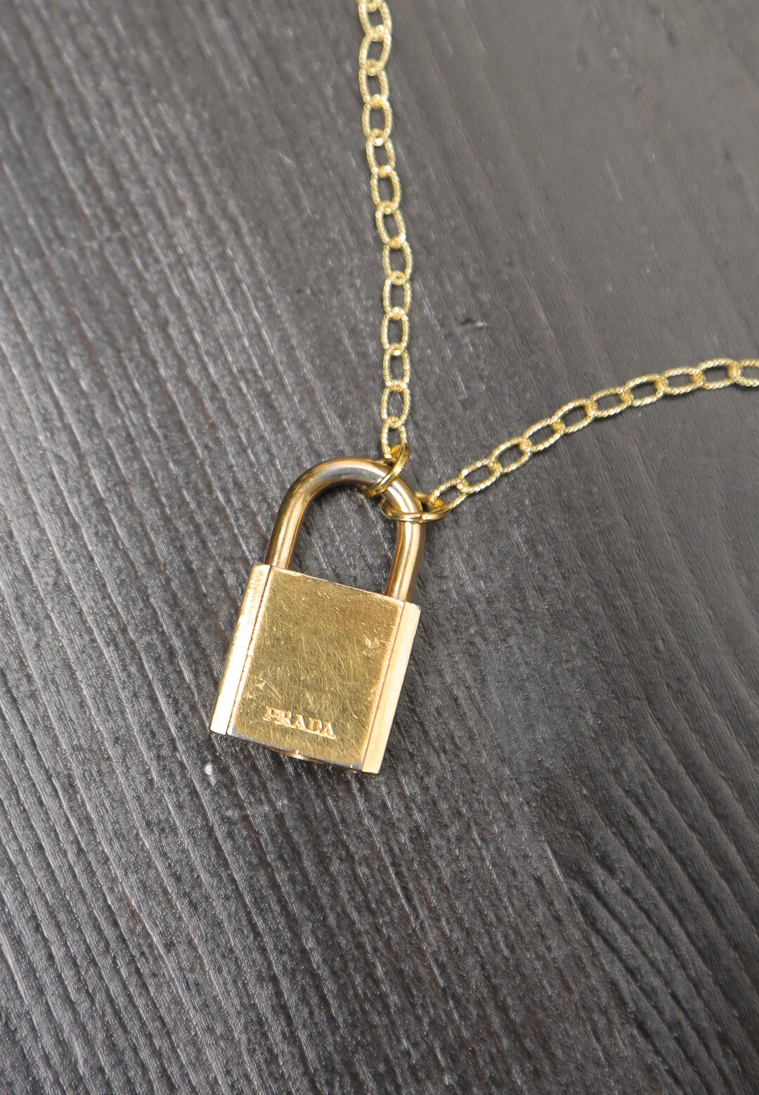 Prada hotsell lock necklace