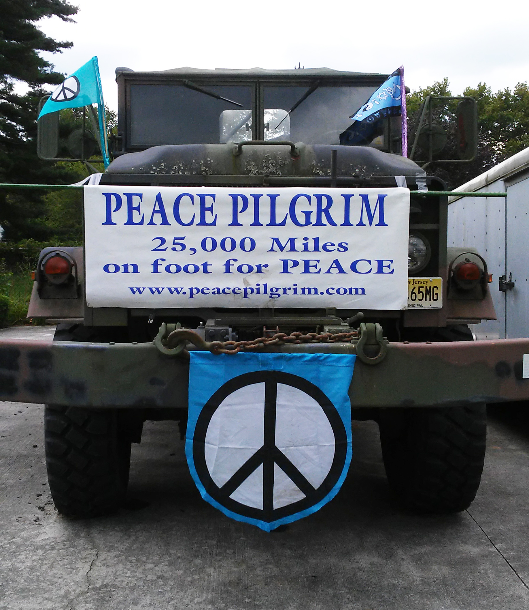 Peace banners on repurposed municipal vehicle