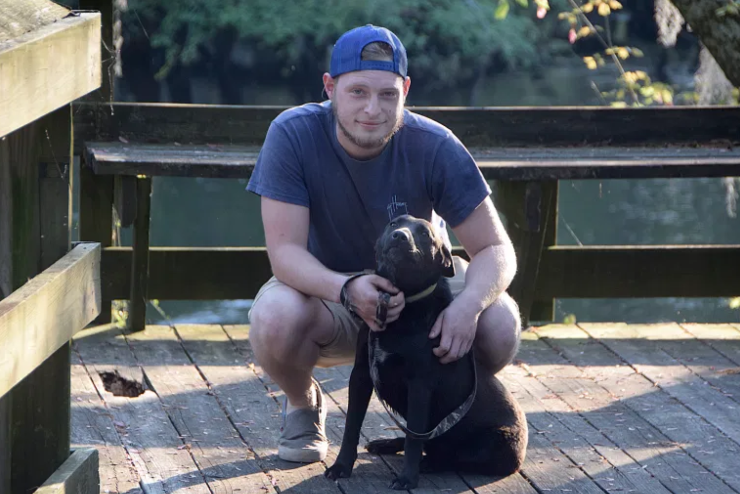 Luke Robinson with his dog Cooper.