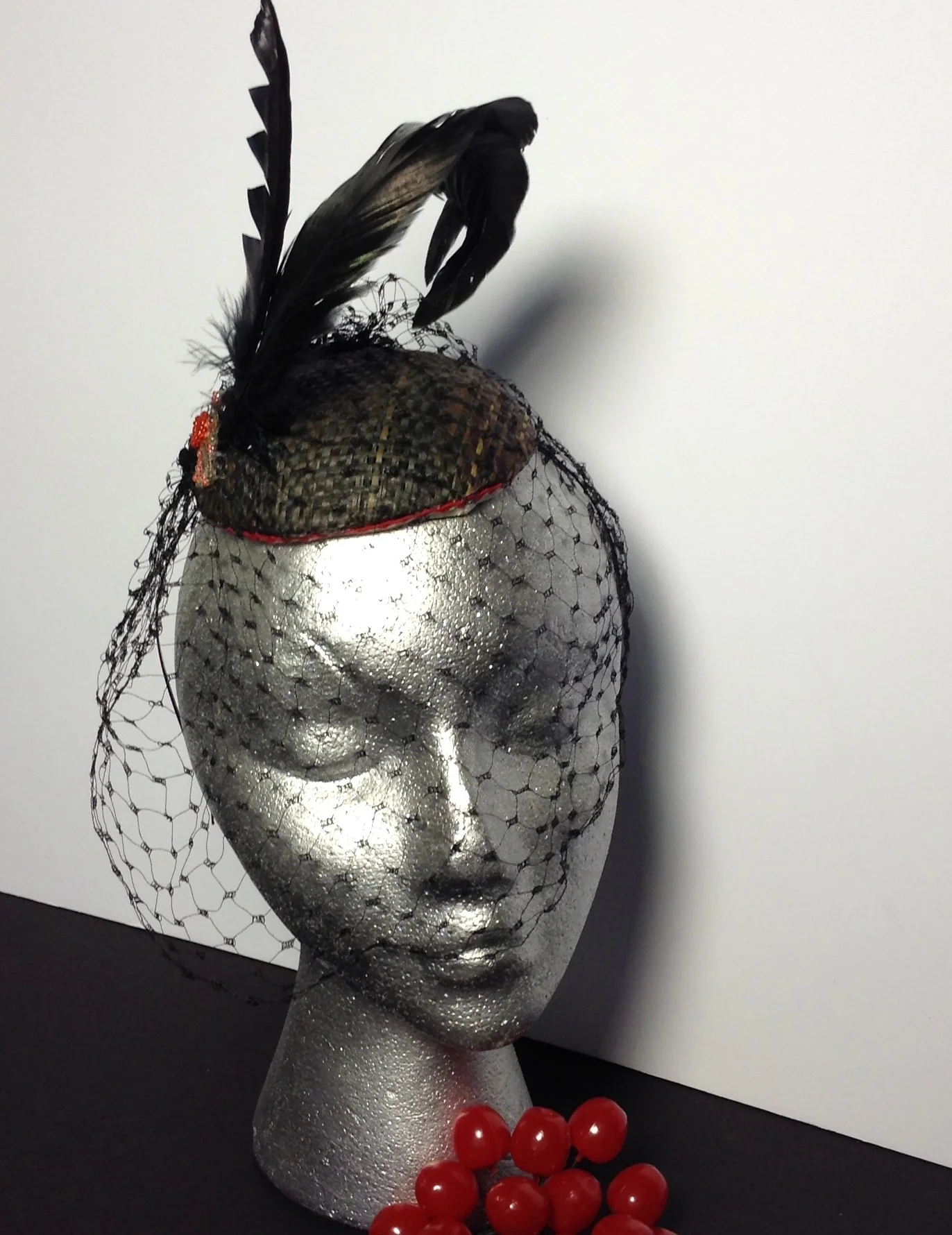 black fascinator hat with veil