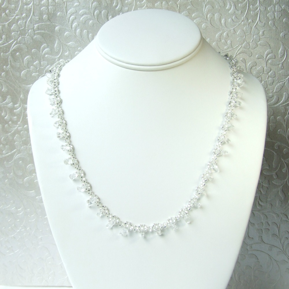 n22f-clear-quartz-crystal-white-wrap-bracelet-necklace.jpg