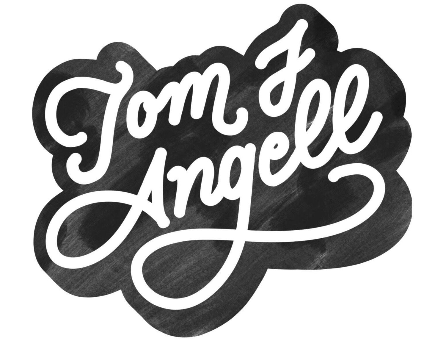 Tom J Angell