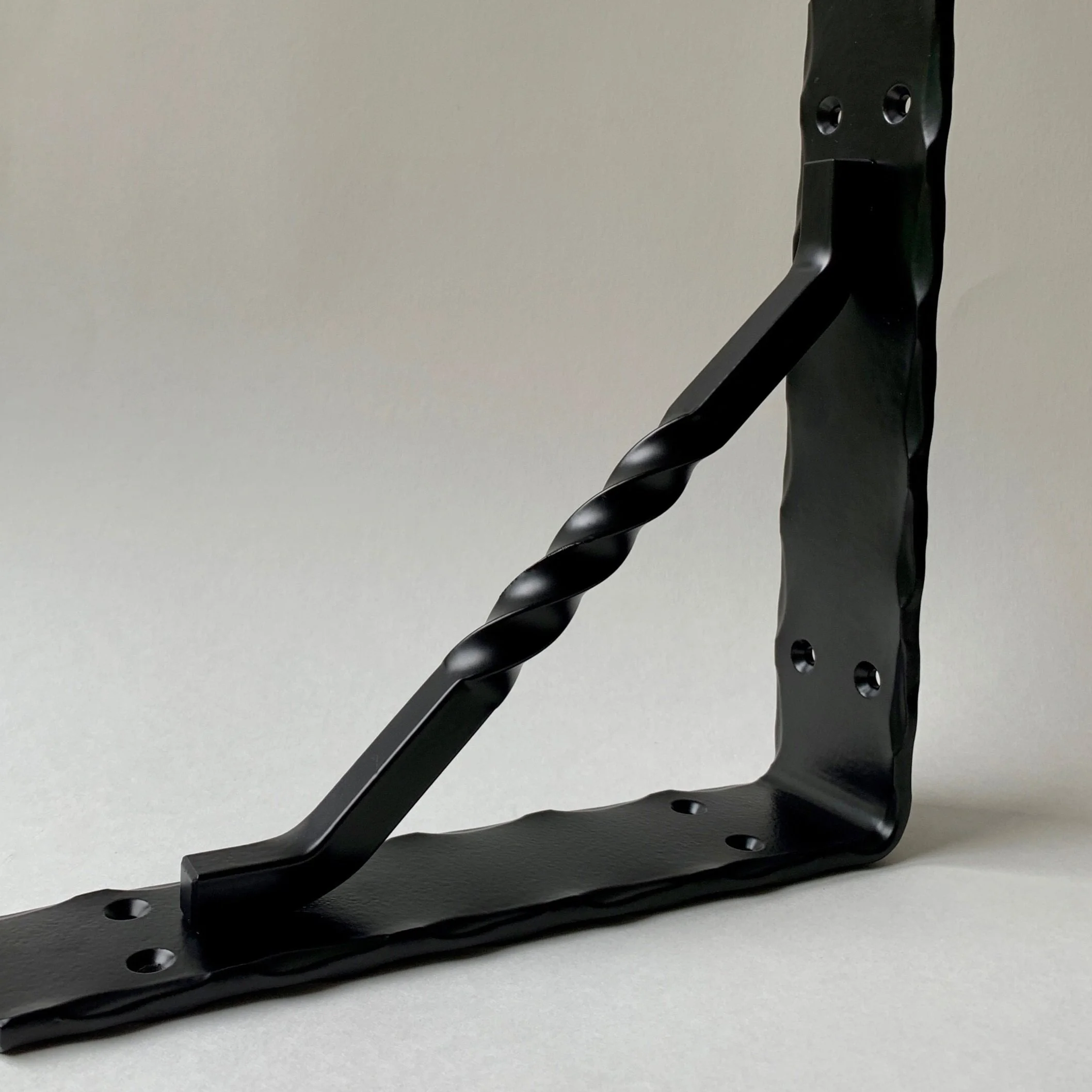 Edge Hammered Raised Twisted Corbel Square Ends 2