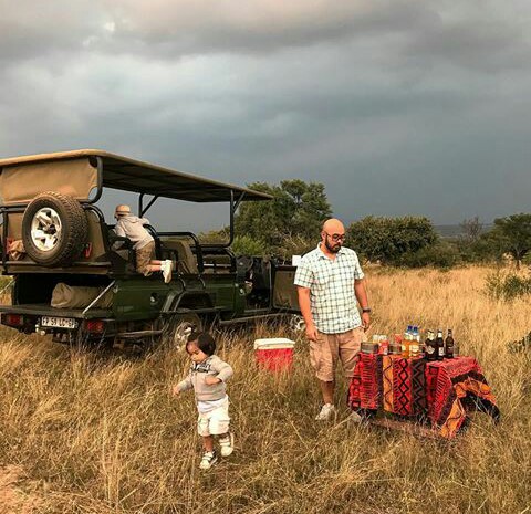 Chal's husband and their boys at an African safari