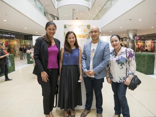 Janice and Stan with guests at the Nearness of We ribbon cutting ceremonies