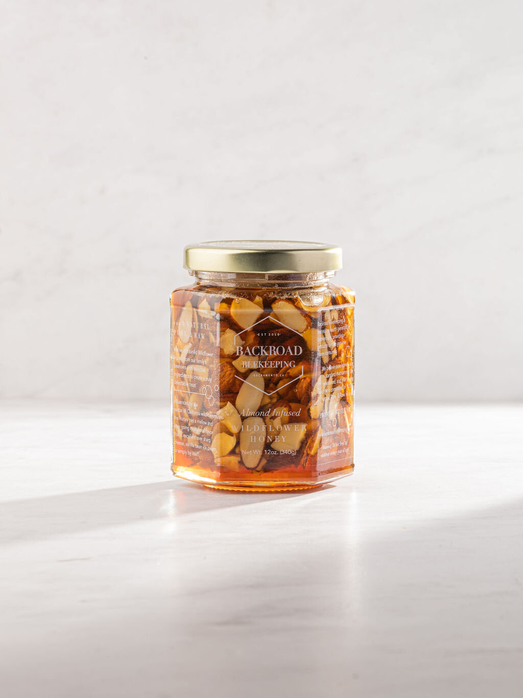 BACKROAD BEEKEEPING-Shop Raw Honey | Almond Infused Wildflower Honey