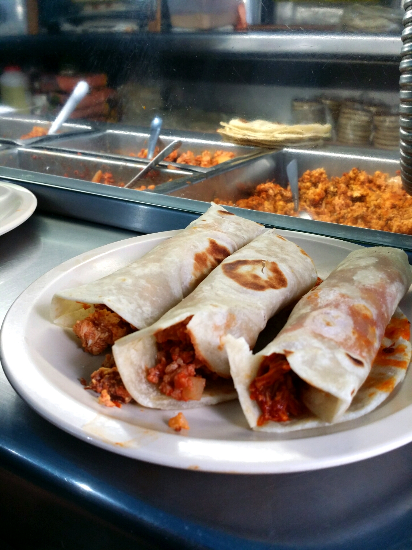 炸玉米饼_norteños_at_la_tonina_photo_nicholasgilman.jpg。