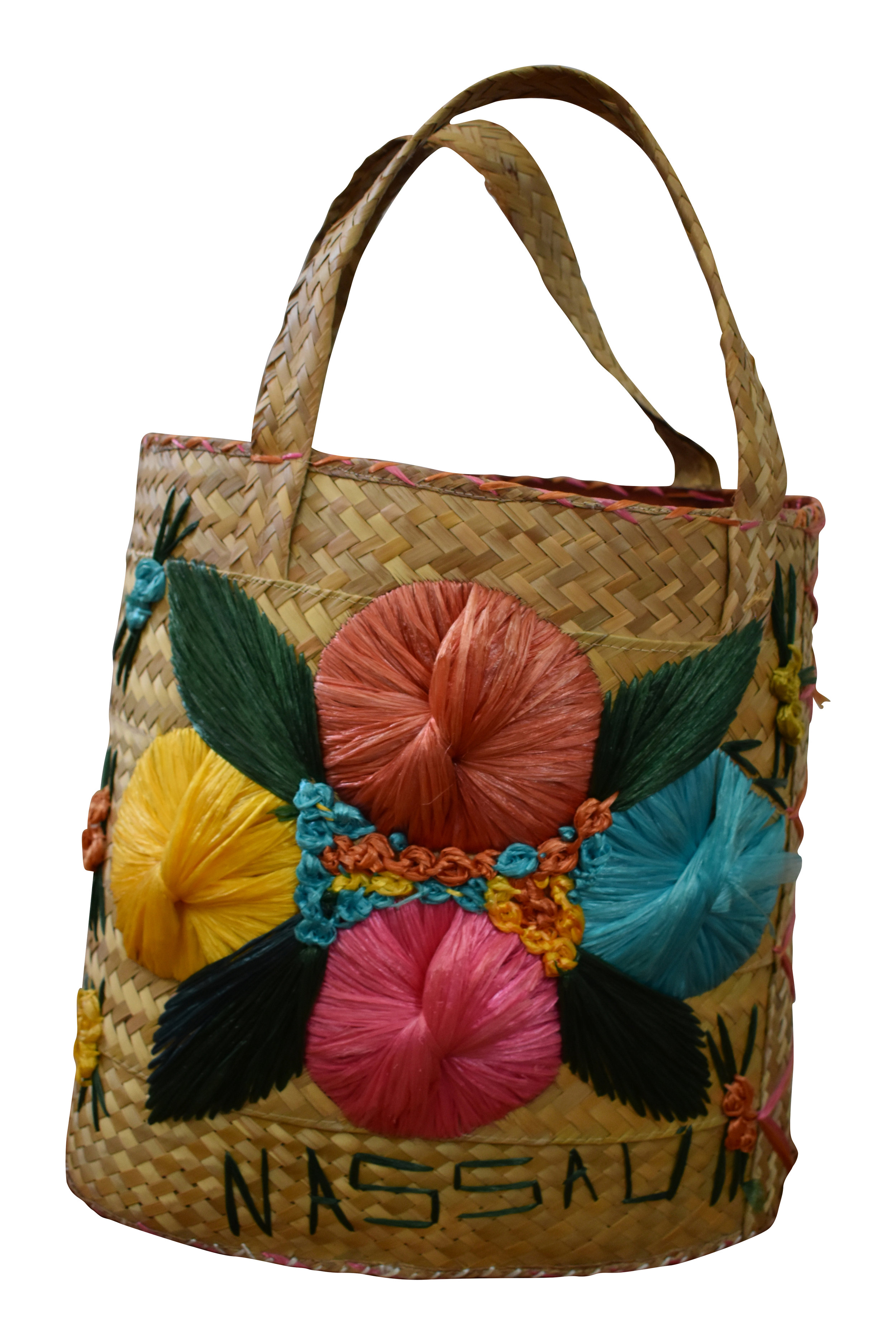 wicker beach bag with pom pom