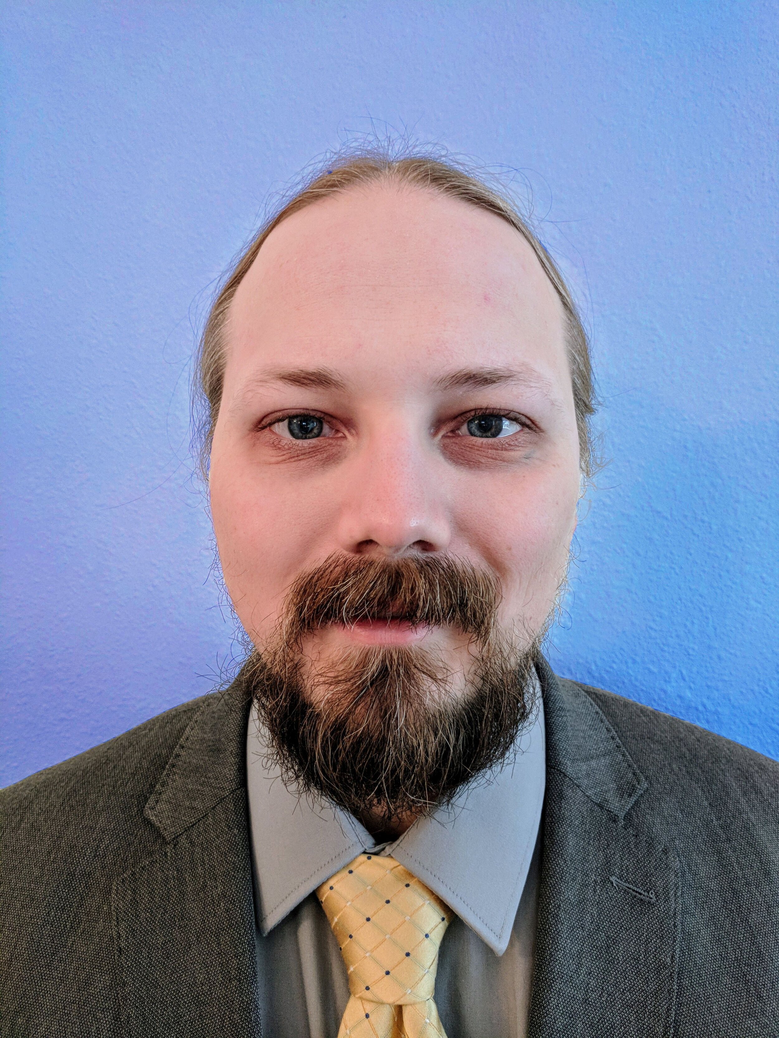 Jacob_Headshot_Blue-Jacob Wood.jpg
